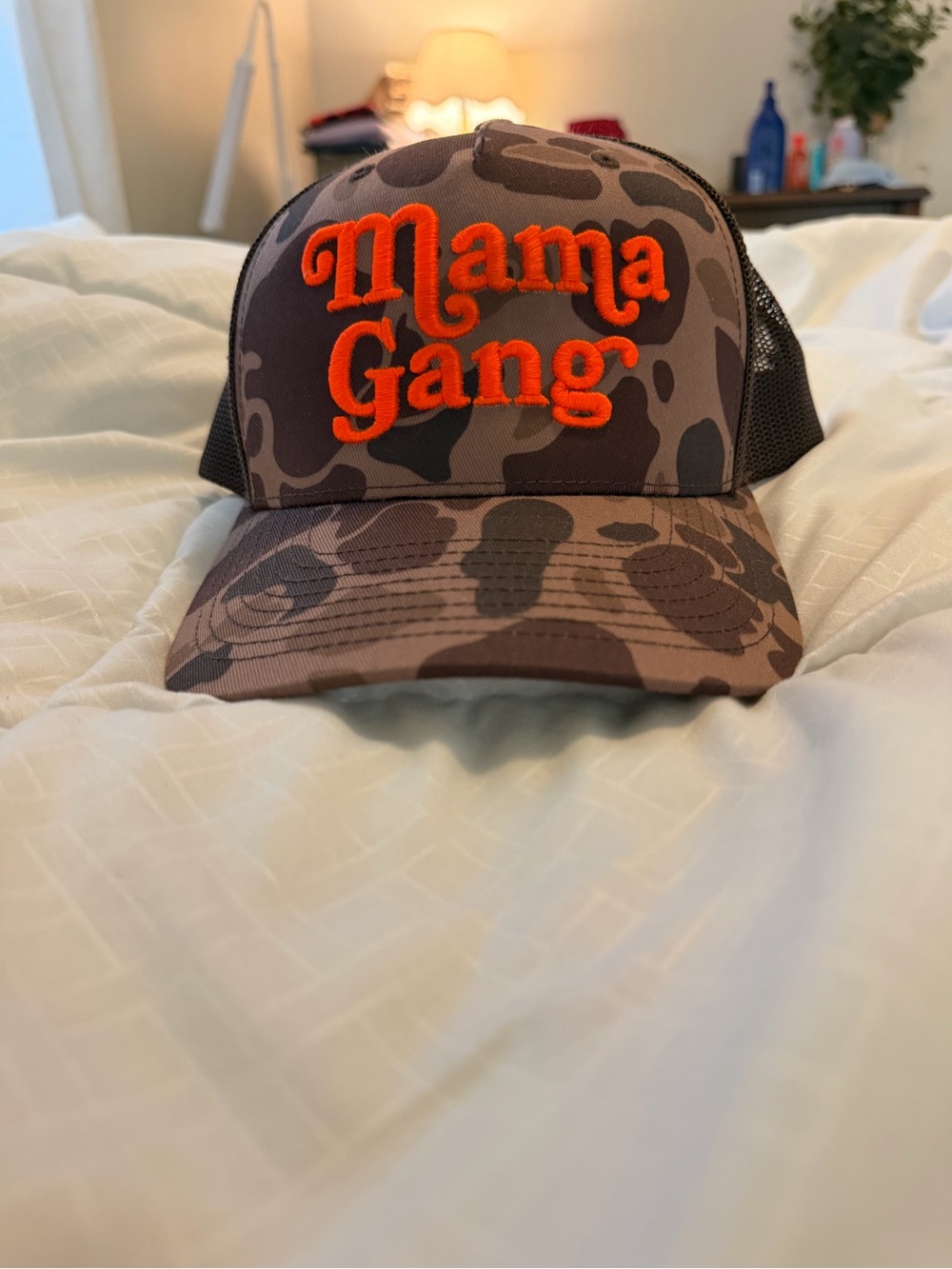 Women's Camo Trucker Hat in Orange Embroidery
